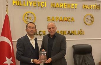 "Türk İslam Ülküsü’nün Işığı Hoca Ahmet Yesevi" kitabının yazarı İlhan Ayhan Mhp Sapanca İlçe Teşkilatını ziyaret etti